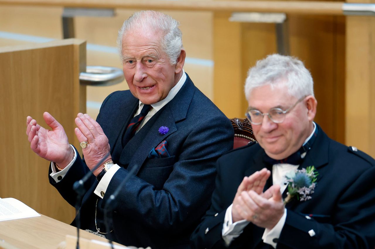 King Charles III (L) applauds with Presiding Officer Kenneth Gibson MSP in the Debating Chamber during opening of the 7th Session Of The Scottish Parliament at the Scottish Parliament Building on June 27, 2026 in Edinburgh, Scotland.Credit: Jeff J Mitchell/Getty