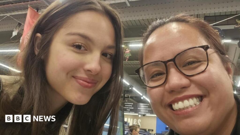 Singer Olivia Rodrigo ‘had to eat sausage rolls all day’ in Llandudno US pop star Olivia Rodrigo takes a selfie with a Llandudno resident. Olivia Rodrigo is on the left and is smiling. Rose is on the right is smiling and is wearing brown framed glasses.