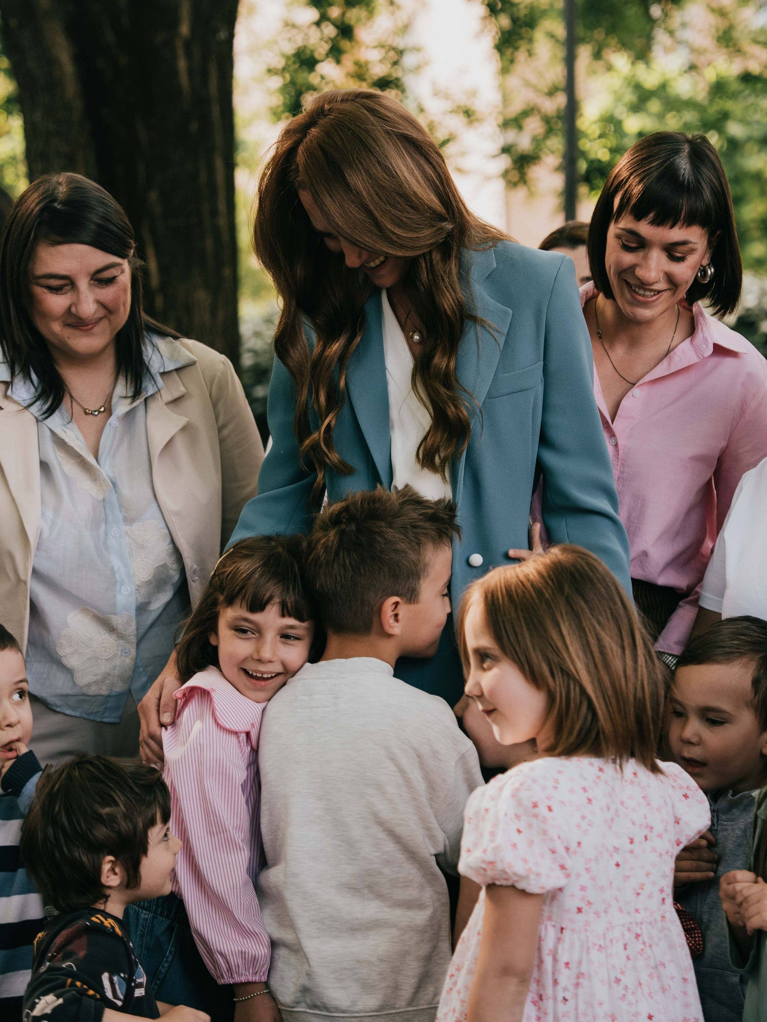 Cuddles for Princess Kate from children in Reggio Emilia, Italy