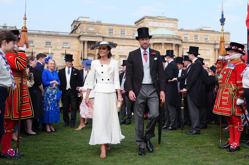 Catherine and William are pictured at a garden party in May.