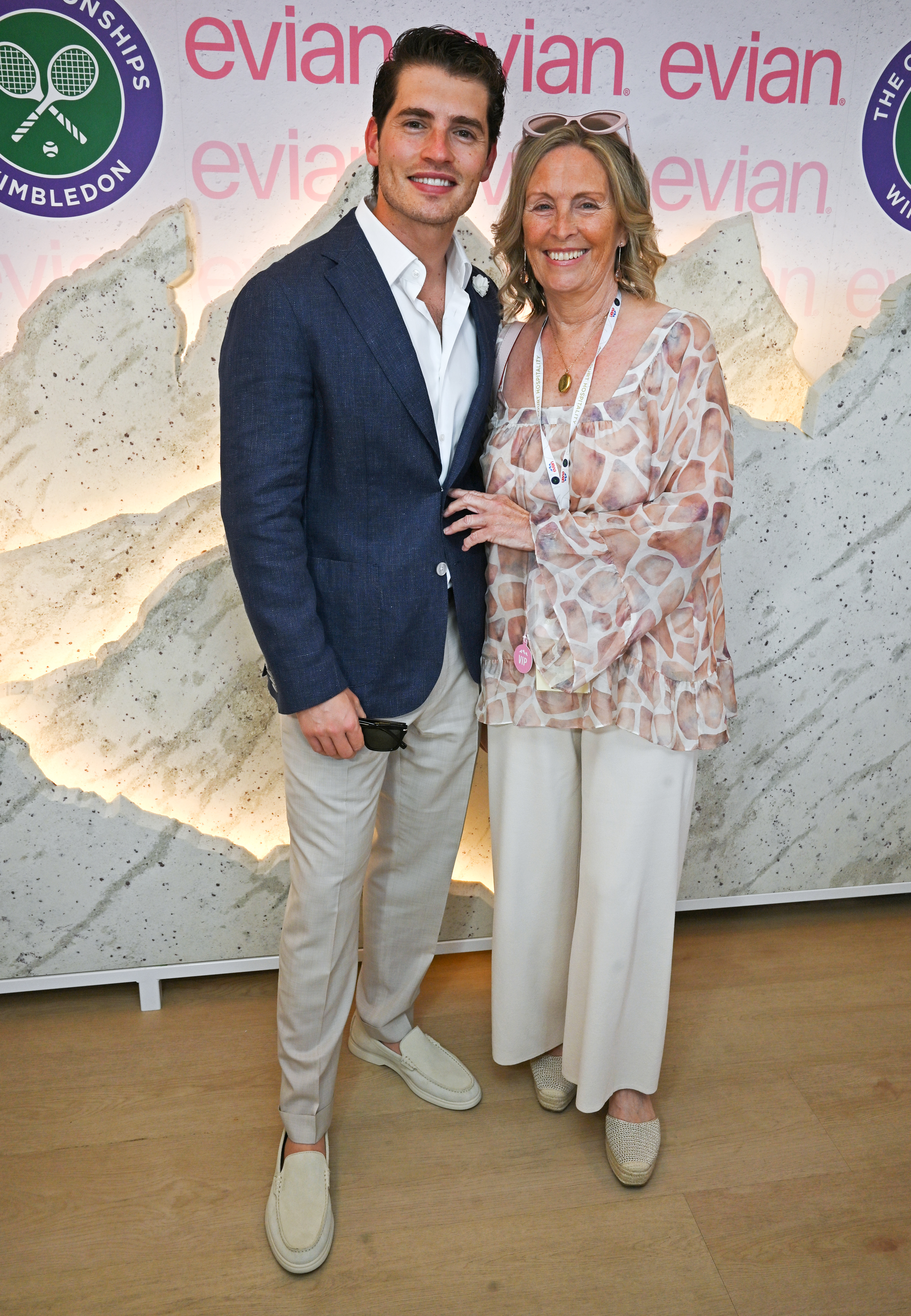 Gregg Sulkin and mother Janice Sulkin attend the evian 'Mountain of Youth' VIP Suite 