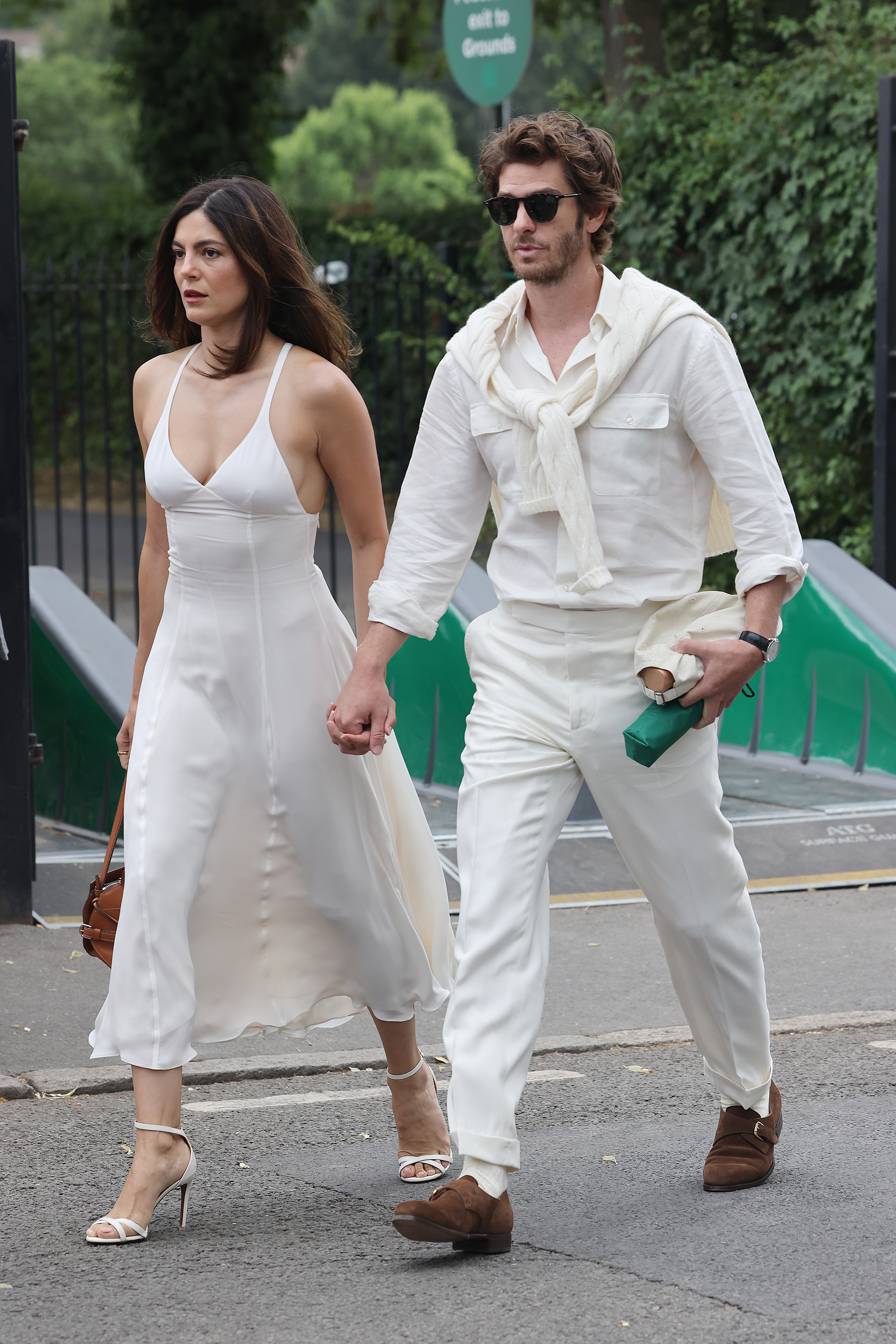 An image of Monica Barbaro and Andrew Garfield, one of the best-dressed celebrities at Wimbledon, in 2024.