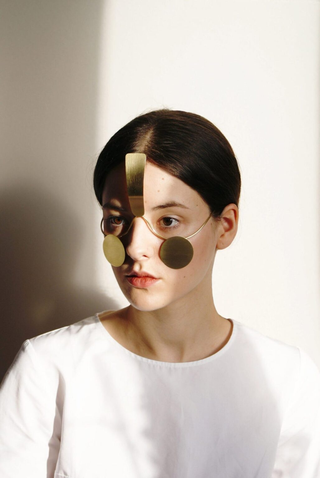 In 2017, Polish designer Ewa Nowak developed a mask that made the wearer's face undetectable to facial recognition algorithms used in public surveillance cameras