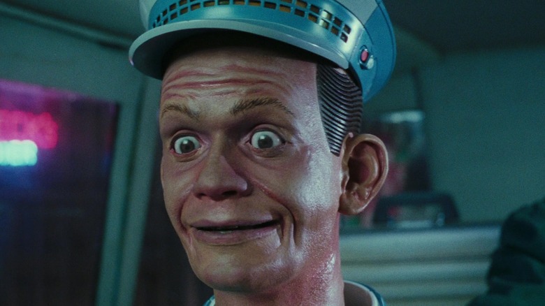 A closeup of the robotic Johnny Cab driver in Total Recall