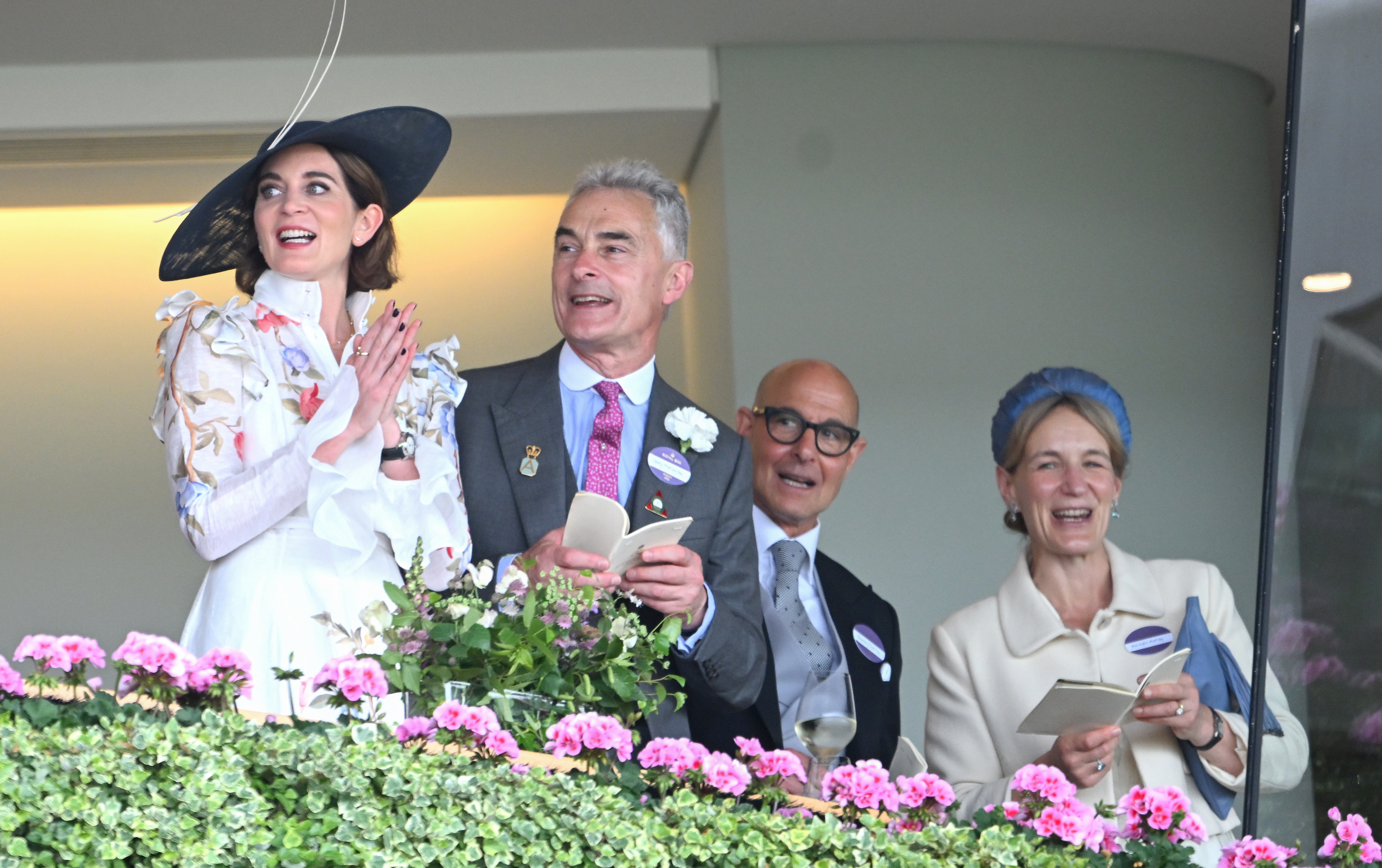 ASCOT, ENGLAND - JUNE 18: Felicity Blunt, Harry Morely, Stanley Tucci and guest attend day three of Royal Ascot 2026 at Ascot Racecourse on June 18, 2026 in Ascot, England. (Photo by Samir Hussein/WireImage)
