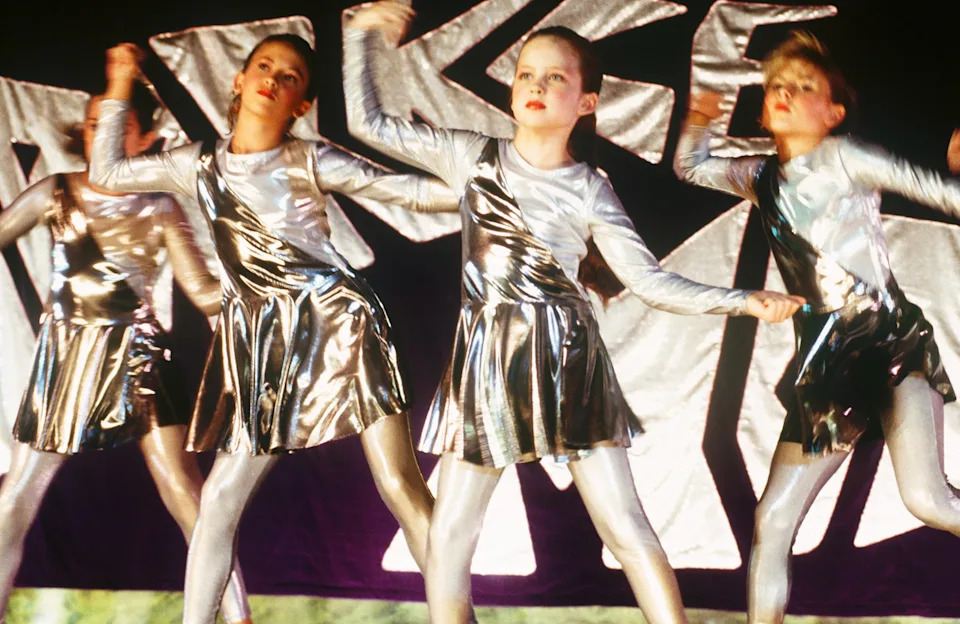 Daveigh Chase (center right) dances in Donnie Darko in 2001.