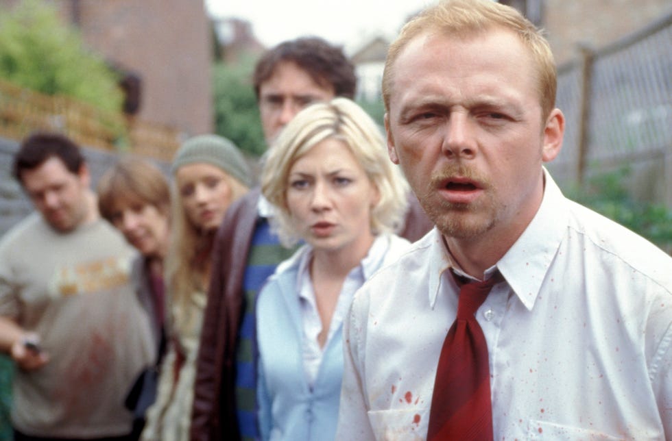 shaun of the dead still, with shaun leading the gang in a line outside, with everyone looking a bit confused