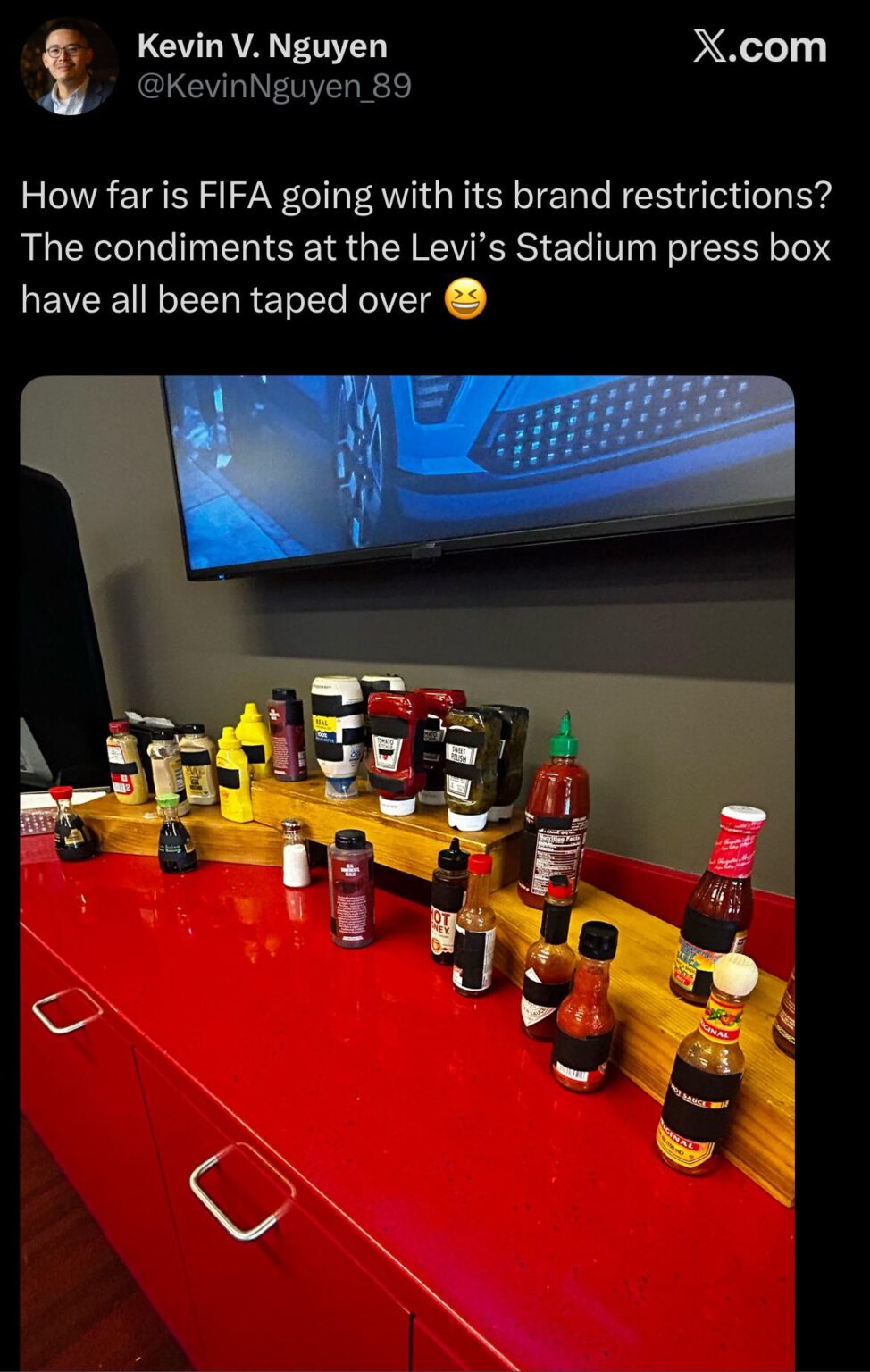 Kevin V. Nguyen The San Francisco Standard sports writer posts picture of condiments in Levi's Stadium press box being taped over to comply with FIFA brand restrictions.
