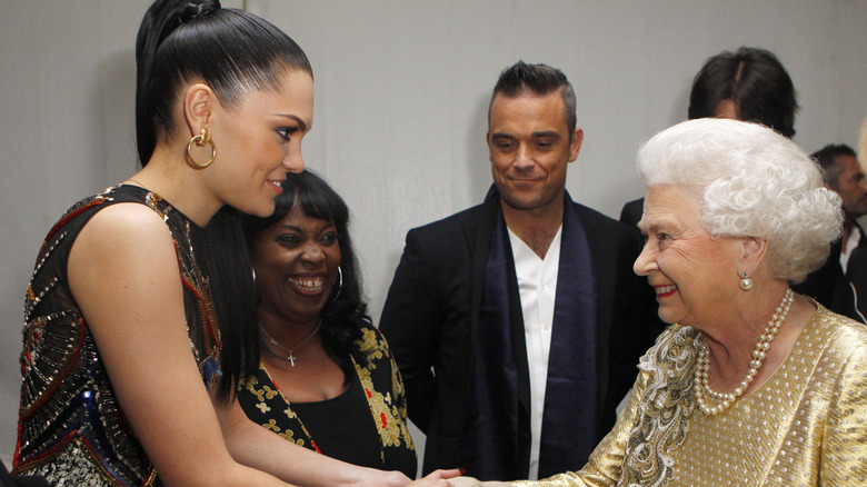 Queen Elizabeth II meeting Jessie J at the Diamond Jubilee in 2012