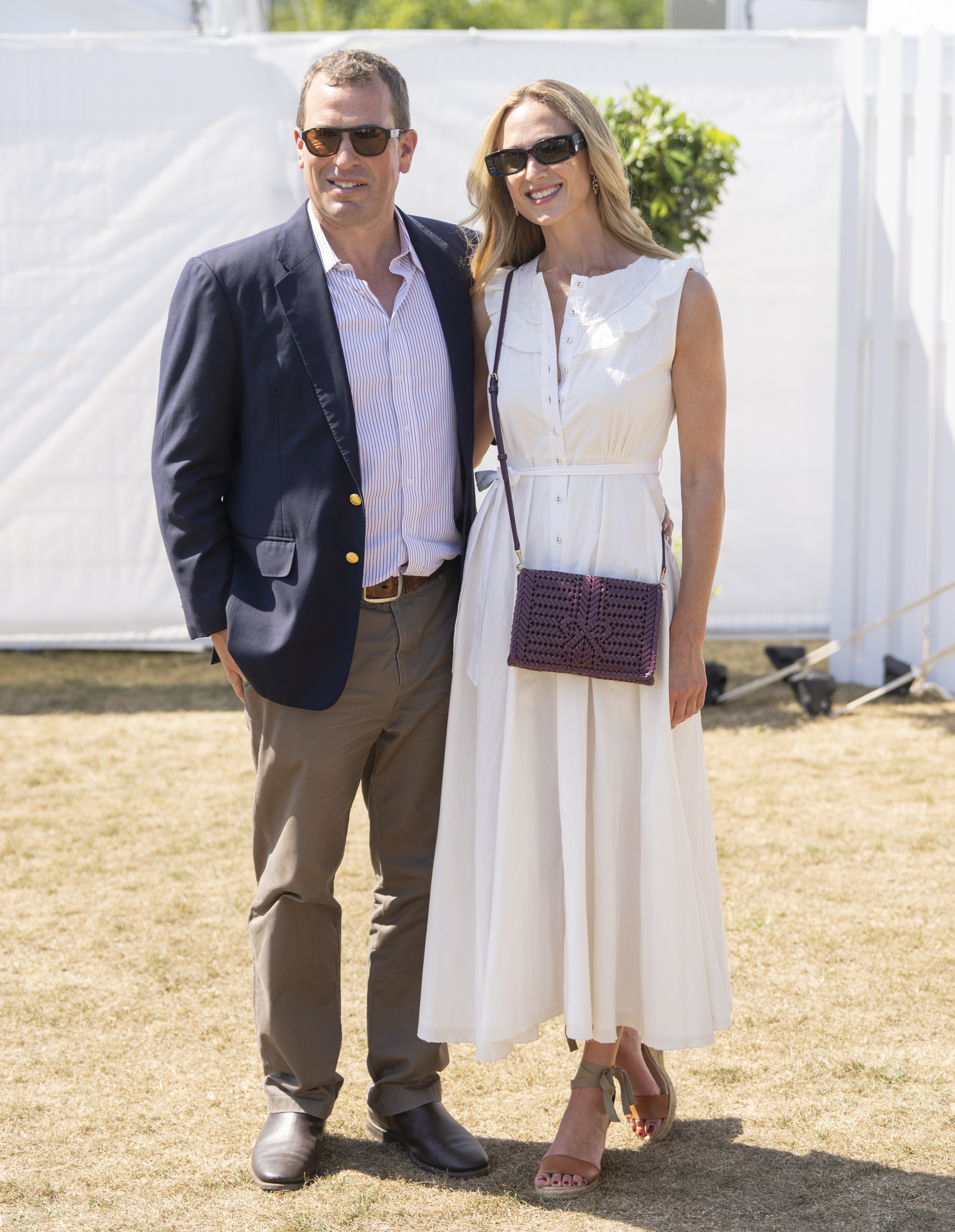 Harriet Sperling and Peter Phillips posing at a polo match