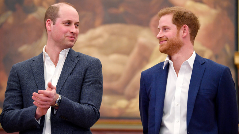 William, Prince of Wales and Prince Harry, Duke of Sussex smiling together