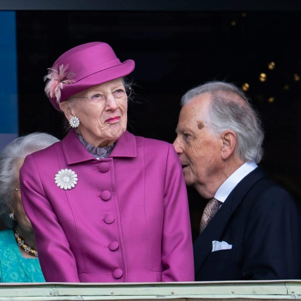 Queen Margrethe back to work after hospital stay, using walker