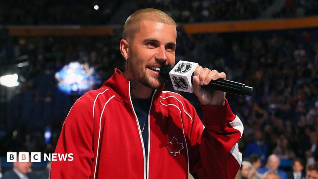 Justin Bieber joins Madonna, Shakira, BTS at Fifa World Cup half-time show Threeomen with the English flag painted on their faces