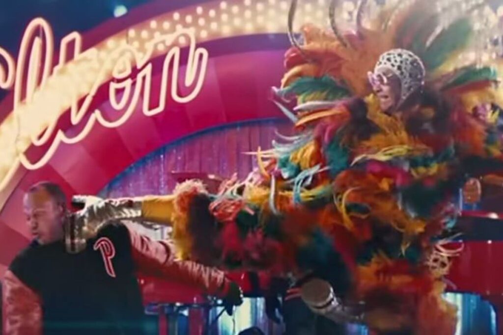 Top movie stuntmen sue over clip of Elton John kicking them in the face Top movie stuntmen sue over clip of Elton John kicking them in the face