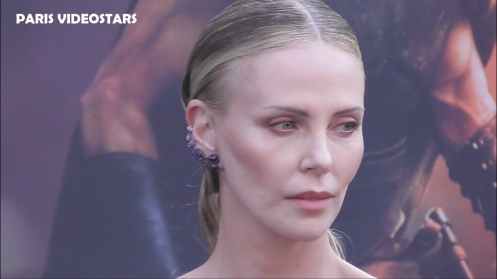 Charlize THERON arrival at The Odyssey avant premiere @ Paris 8 july 2026 red carpet