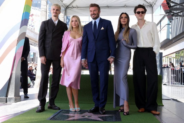 David Beckham poses with his wife Victoria Beckham, his daughter Harper Beckham and his sons Cruz Beckham and Romeo Beckham during his star unveiling ceremony on the Hollywood Walk of Fame