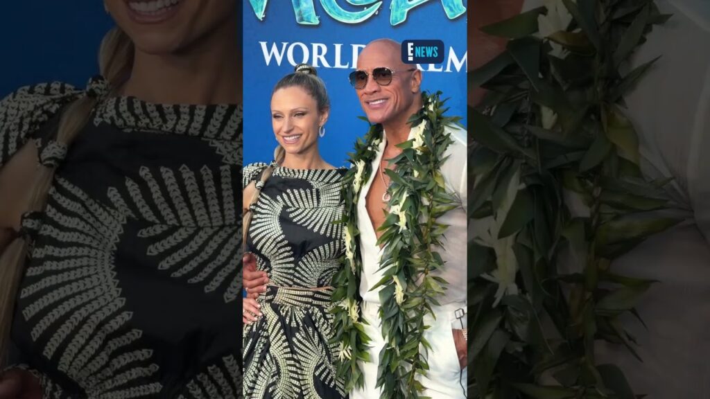 Dwayne Johnson and Lauren Hashian pose at the LA premiere for "Moana."