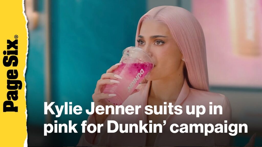Kylie Jenner suits up in pink — with hair to match — in new commercial