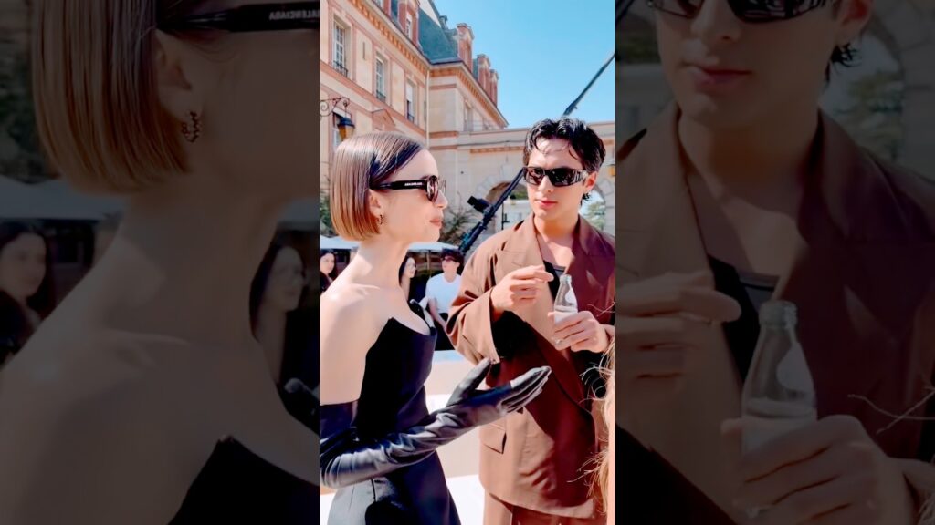 Lily Collins & Hudson Williams at the Balenciaga show in Paris. #lilycollins #hudsonwilliams