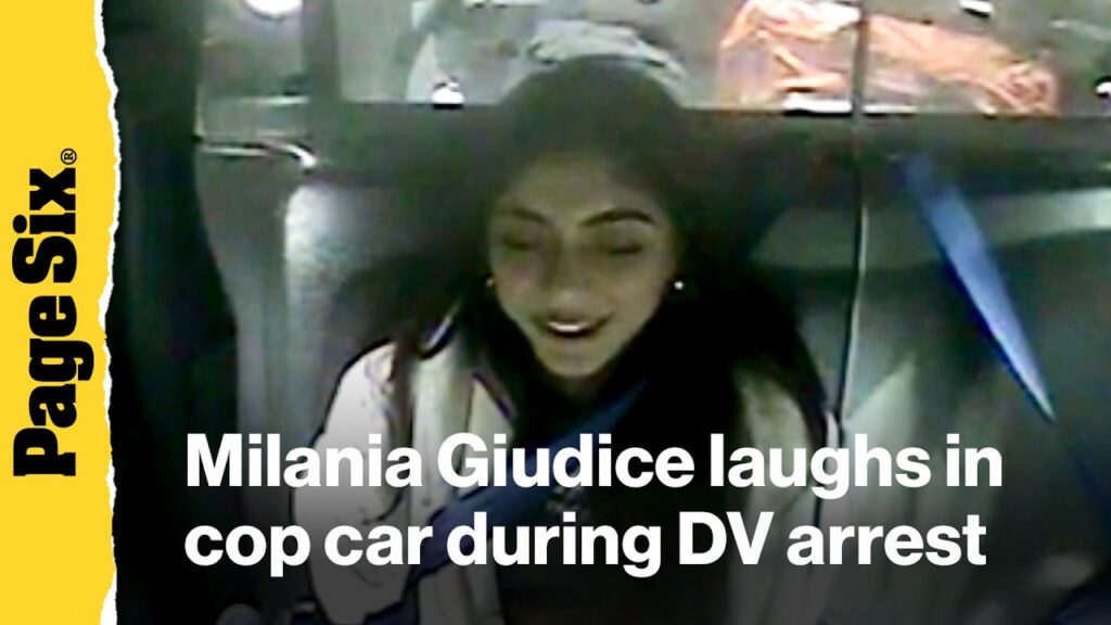 Milania Giudice laughs in back of cop car during domestic violence arrest Milania Giudice laughs in back of cop car during domestic violence arrest