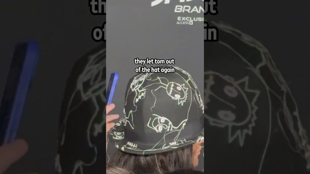 Tom Escapes Hat Again For Spider-Man Premiere