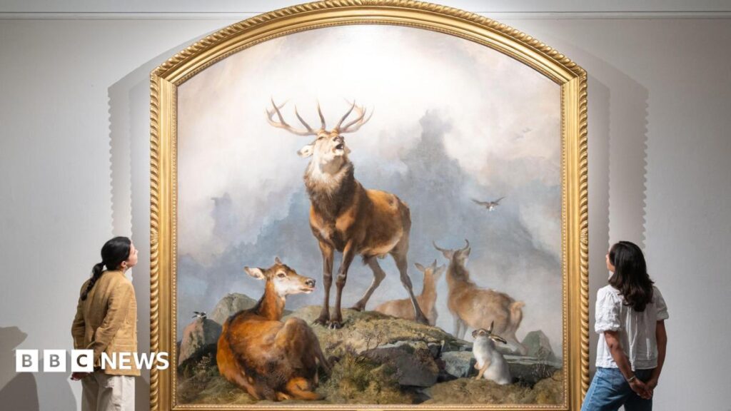 Monarch of the Glen sister painting sells for £5.9m at auction A woman with shoulder-length blonde hair talks into a microphone
