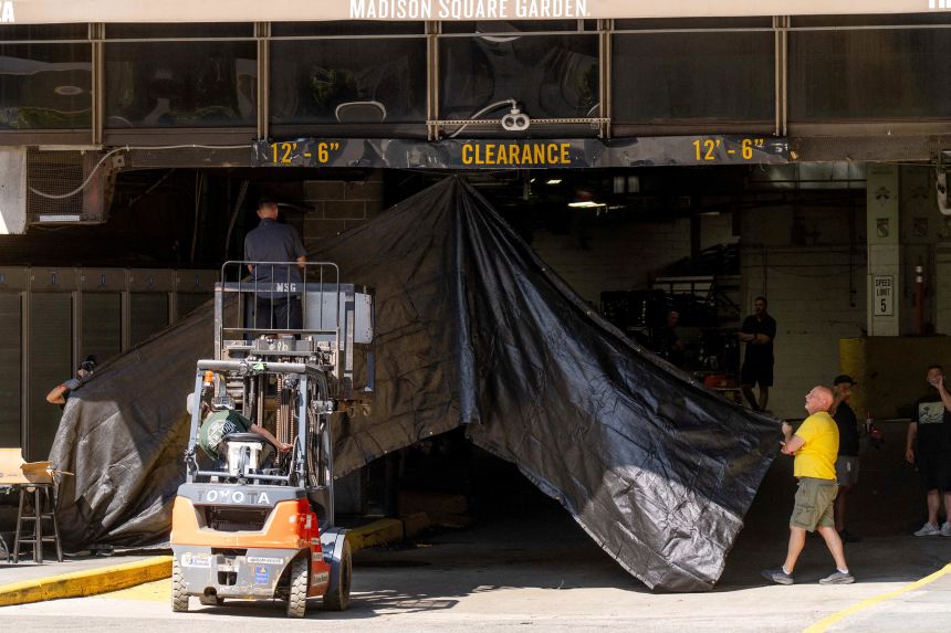 A tarp is installed for privacy at a loading dock at Madison Square Garden, ahead of a reported wedding between Taylor Swift and Travis Kelce on Wednesday.