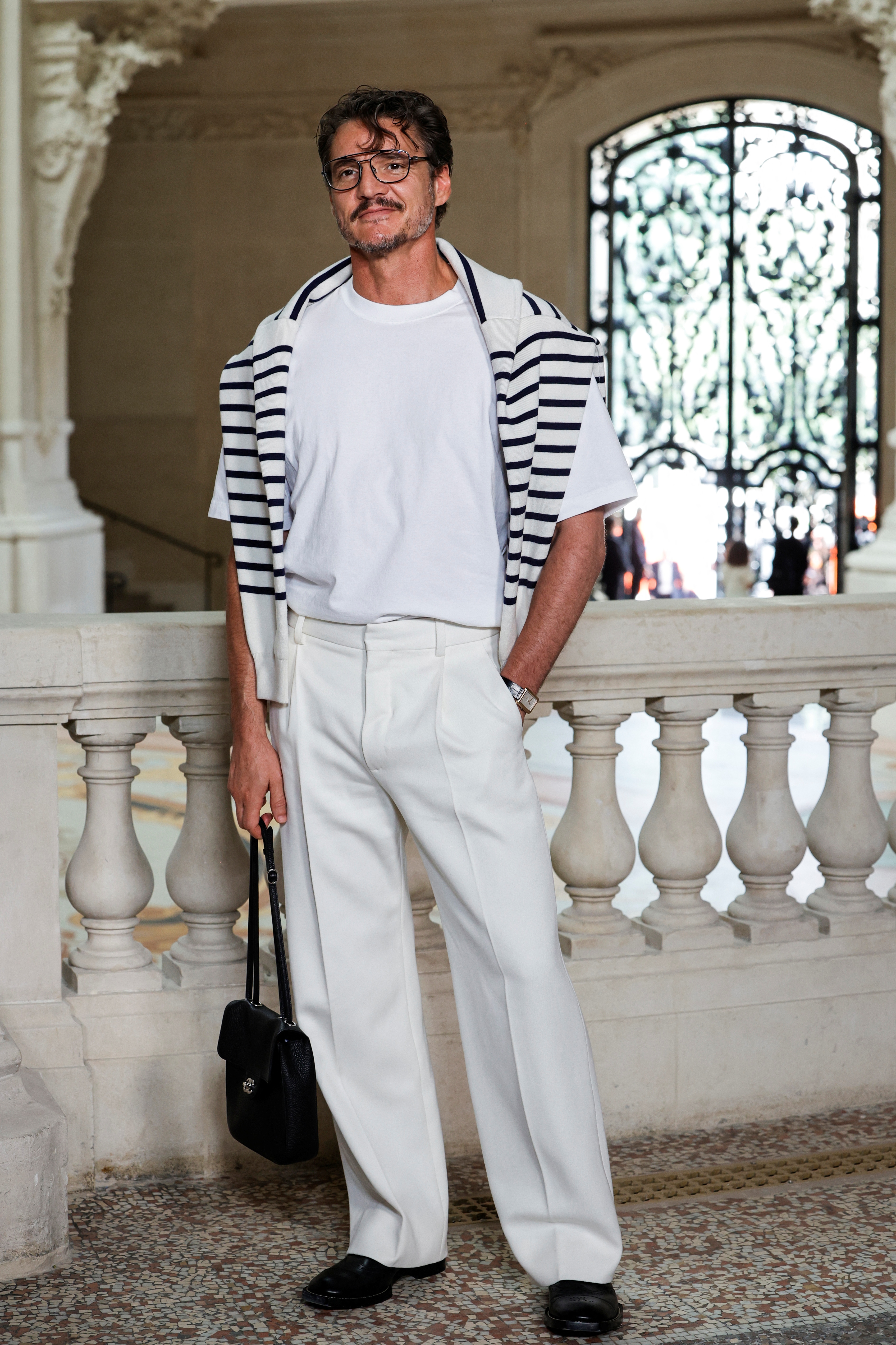 Pedro Pascal attends the Chanel show.