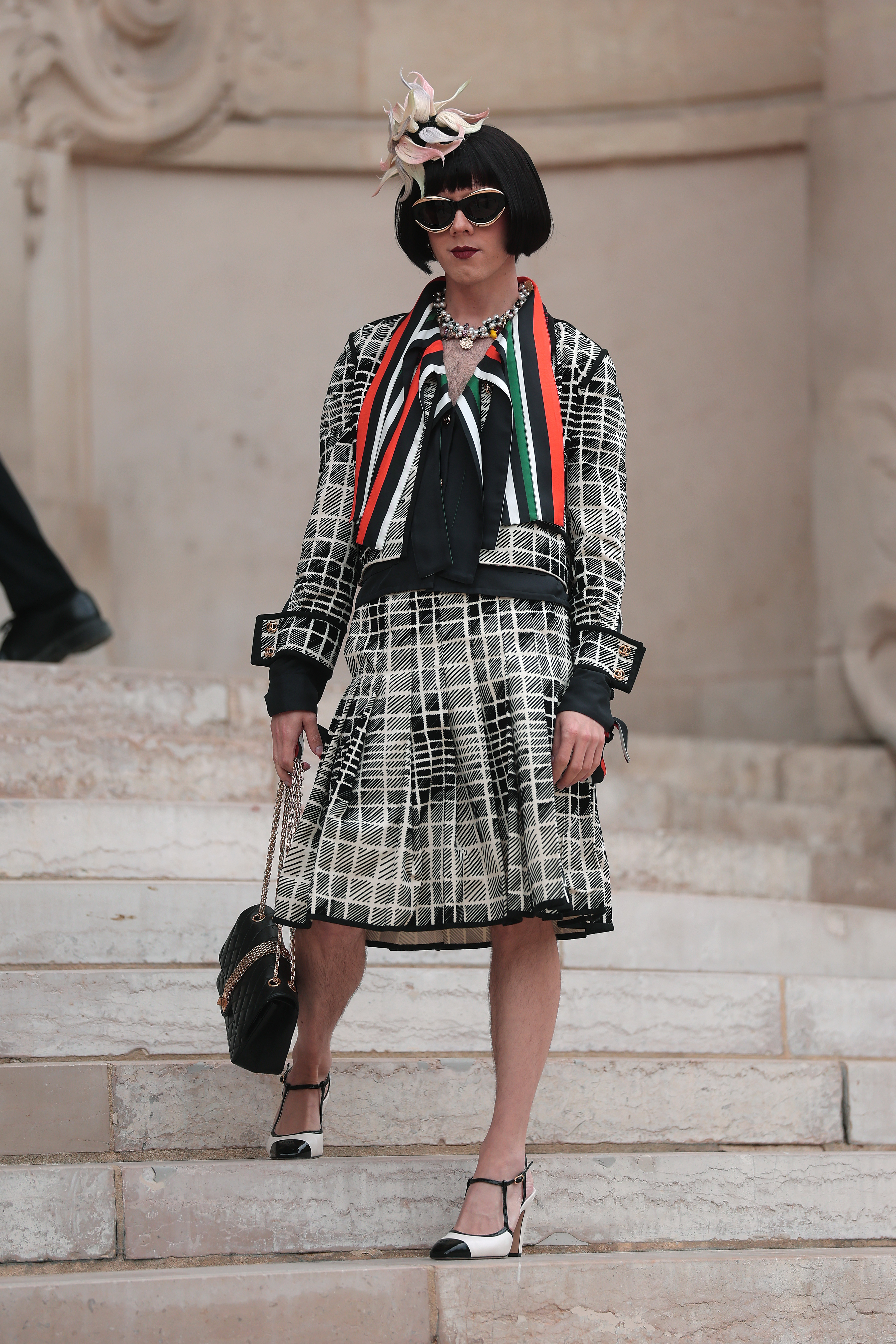Cole Escola attends the Chanel show.