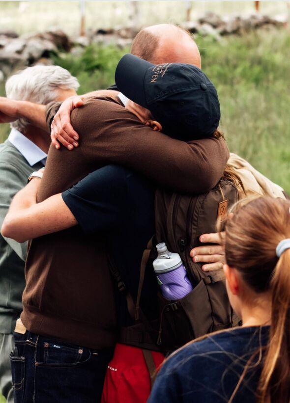 The Prince of Wales hugs the Princess of Wales