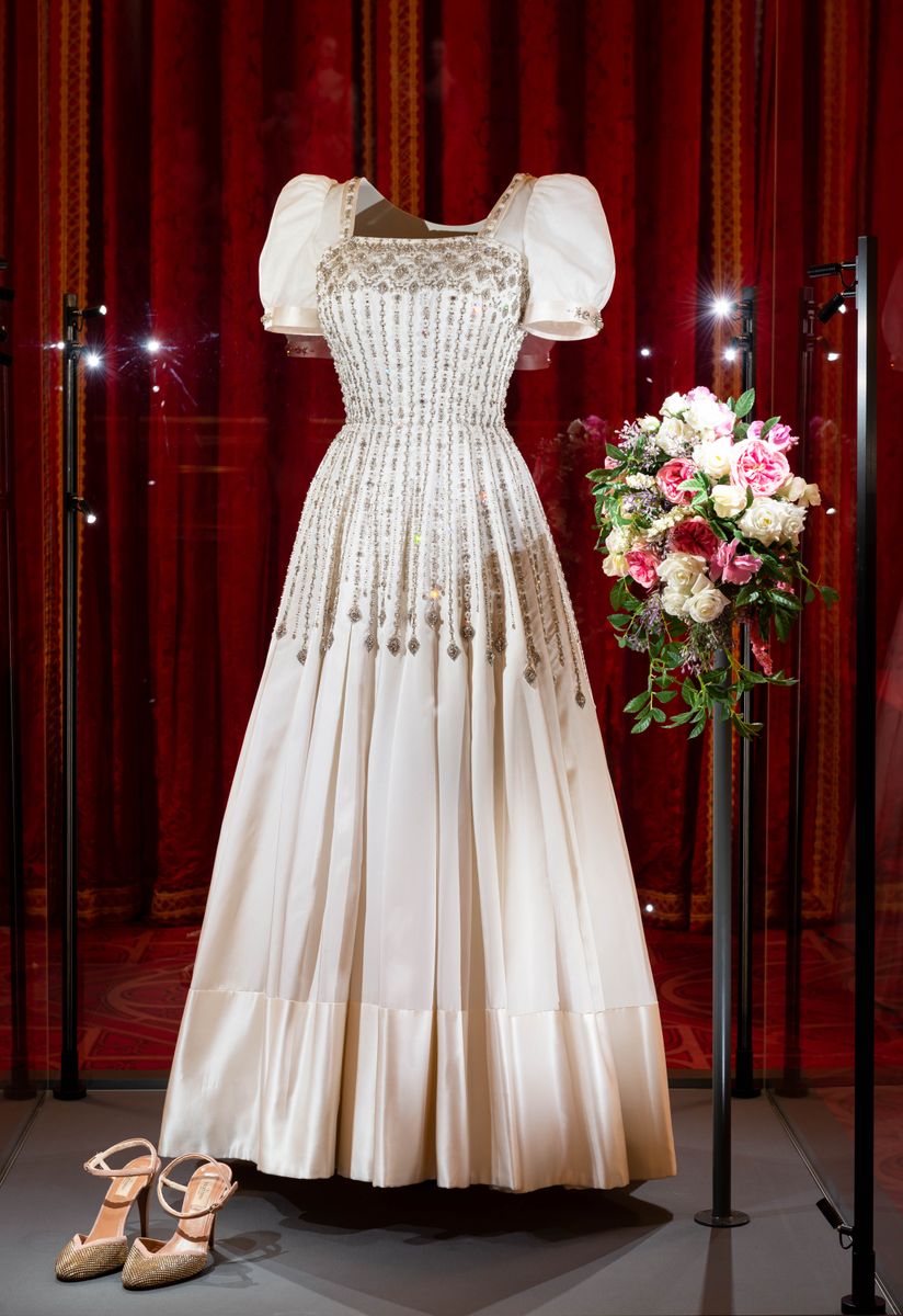Princess Beatrice's wedding gown, designed by Norman Hartnell, was originally created for Queen Elizabeth II and carefully adapted for the royal bride.