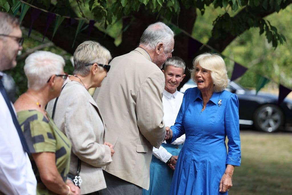 Queen Camilla meeting Terry Waite during a visit to Emmaus Norfolk and Waveney charity in Bungay, Norfolk, which offers a home, work opportunities and support to people experiencing homelessness. Picture date: Monday July 20, 2026.