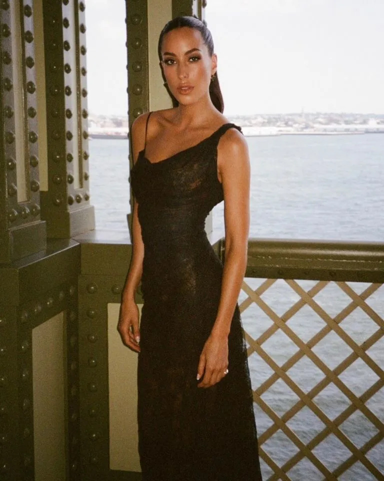 Ines de Ramon posing in a sheer black dress for Taylor Swift and Travis Kelce’s weddingCredit: Laurie Zanoletti/Instagram
