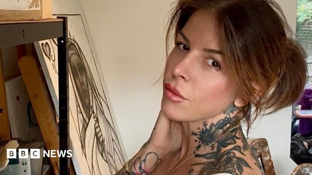Bottomless tattoo events cheapen industry, say artists A woman is sitting down and looking at the camera posing, showing her tattoos on her neck and wrist.
