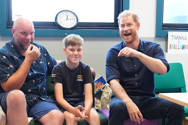 Prince Harry, Duke of Sussex, Patron of WellChild, meets patient Wyatt Makwana, 12, who was born with a congenital diaphragmatic hernia, with father Brian Makwana during a visit to the Birmingham Children’s Hospital