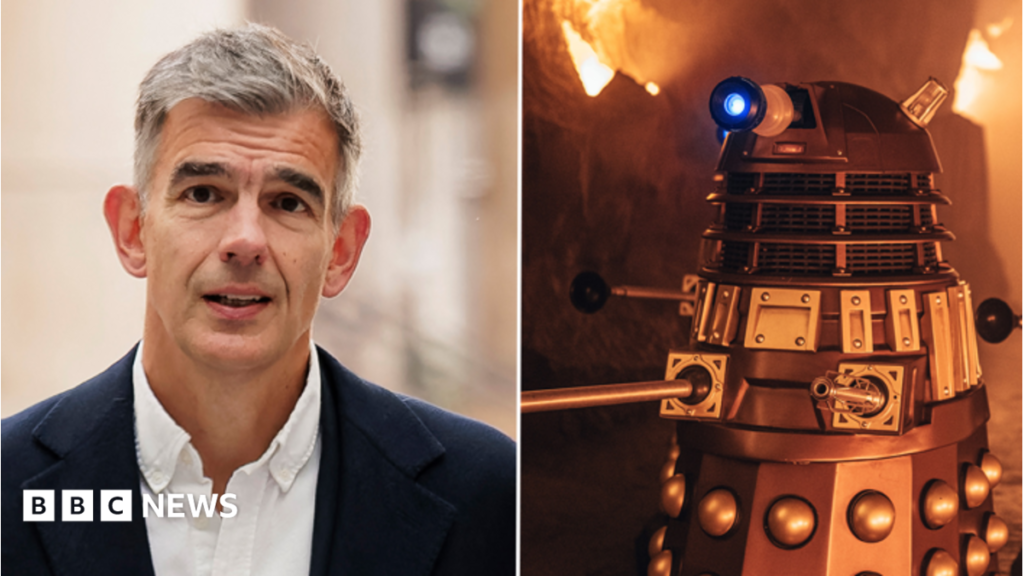 BBC ‘working hard’ on the future of Doctor Who, says director-general A woman with dark hair pulled back from her face points to a plaster on her arm