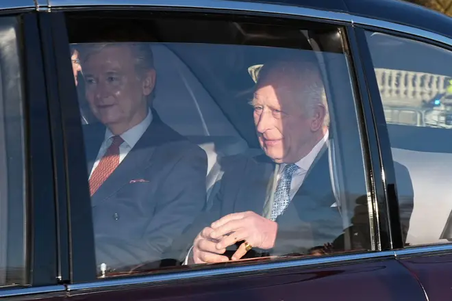 King Charles III and his private secretary Sir Clive Alderton arriving at Buckingham Palace in 2024