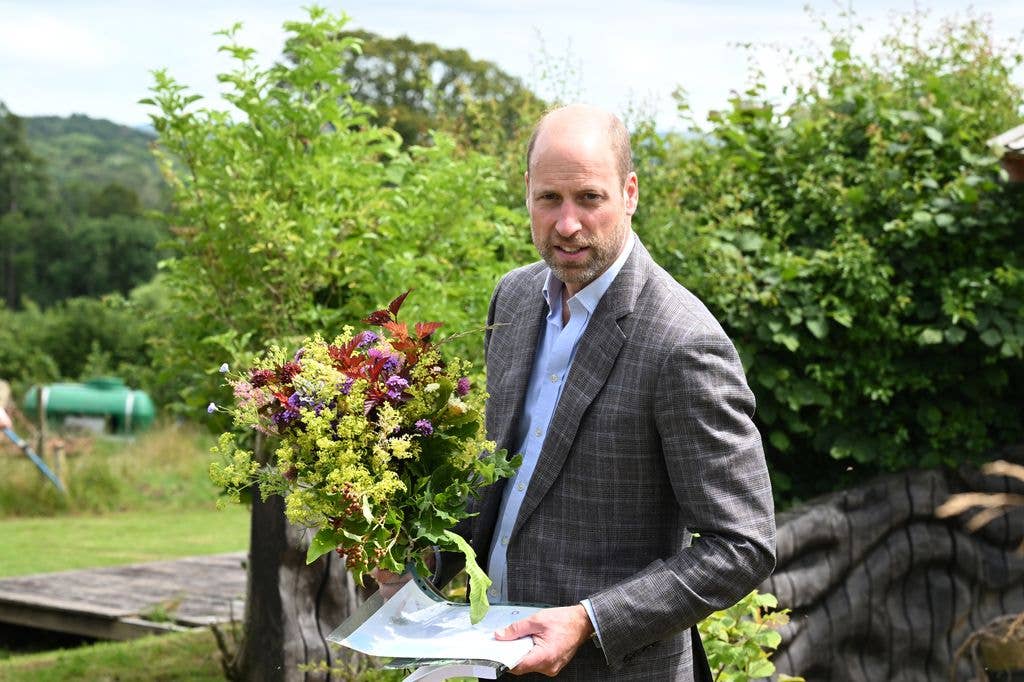 Prince William, Prince of Wales looks on during his visit to the Apricot Centre, a carbon-negative farm and wellbeing service on June 18, 2026 in Totnes, England