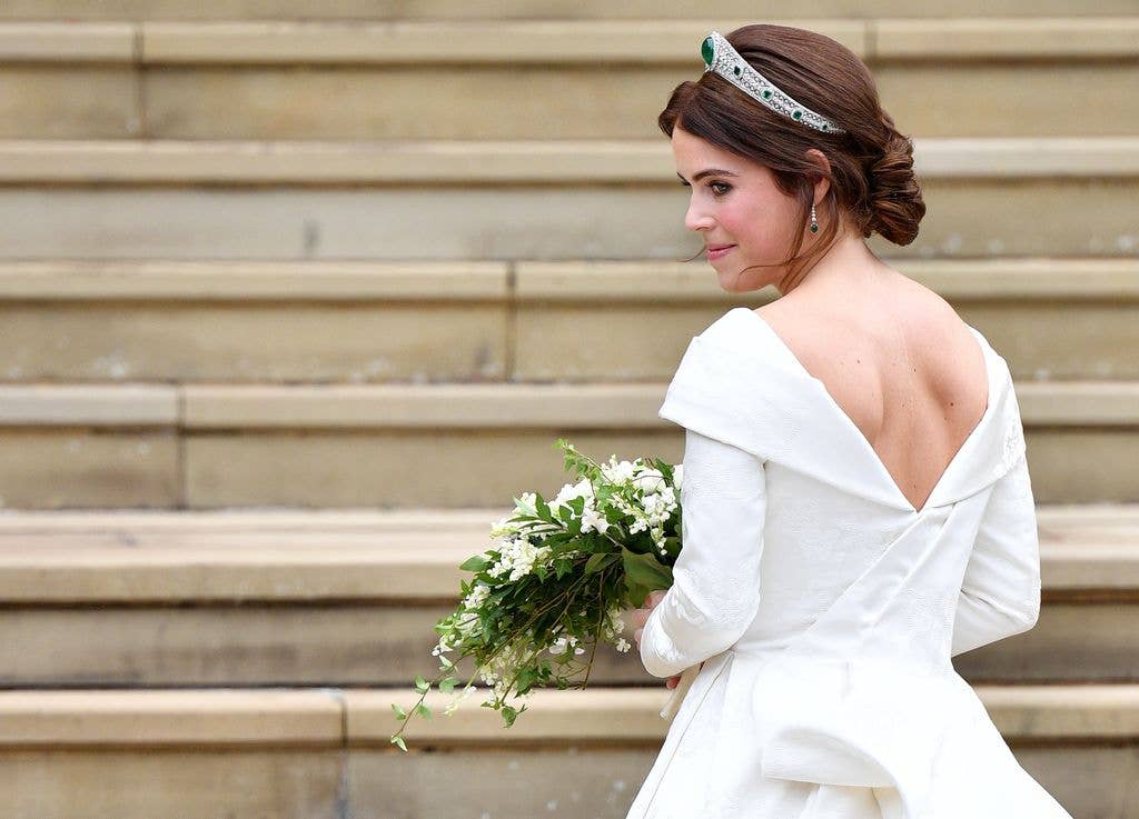 Princess Eugenie looking over her shoulder on the steps of St George's Chapel