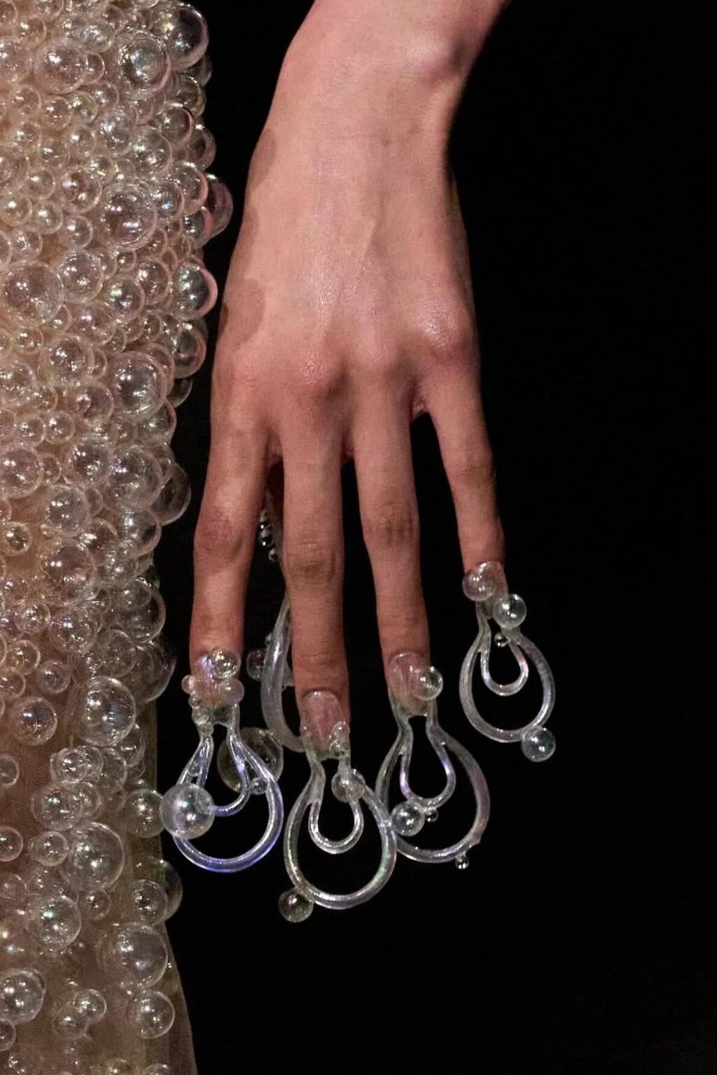 The sculptural nail art at Iris Van Herpen Fall/Winter 2026 Couture, created by artist Juan Alvear