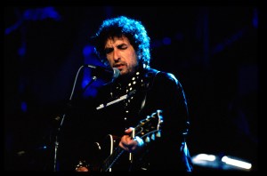 Bob Dylan performs on stage at Guitar Legends, Seville, Spain, 1991. (Photo by Michael Putland/Getty Images)