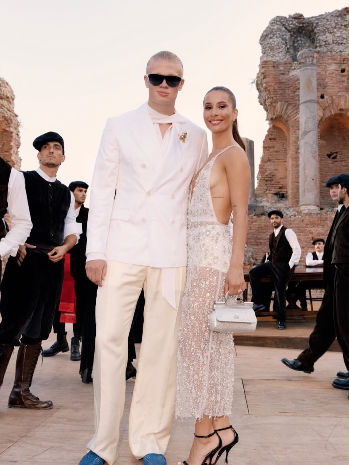 Celebrities at Dolce & Gabbana Alta Sartoria 2026 Erling Haaland and Isabel Haugseng Johansen at the Dolce & Gabbana Alta Sartoria show in Taormina, Italy.