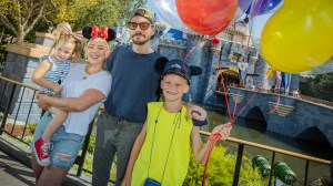 ANAHEIM, CALIFORNIA - JULY 23: In this handout photo provided by Disneyland Resorts, Hilary Duff with her husband, singer-songwriter Matthew Koma, their daughter Banks, 2, and Duff's son Luca, 9 pose on the steps of Sleeping Beauty Castle while spending the day at Disneyland Park on July 23, 2021 in Anaheim, California. (Photo by Christian Thompson/Disneyland Resort via Getty Images)