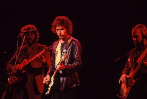 SAN FRANCISCO - NOVEMBER 7: Fred Tackett and Tim Drummond perform with Bob Dylan at the Warfield Theater on November 7, 1979 in San Francisco, California. (Photo by Ed Perlstein/Redferns/Getty Images)