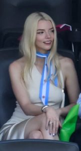 British-US actress Anya Taylor-Joy (C) and husband, US musician Malcolm McRae (R) are pictured prior to the 2026 World Cup football tournament final match between Spain and Argentina at the New York/New Jersey Stadium in East Rutherford on July 19, 2026. (Photo by ANGELA WEISS / AFP via Getty Images)