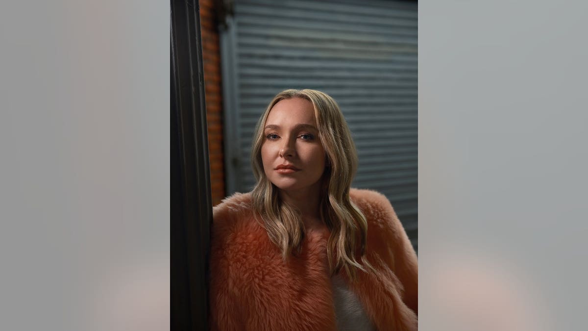 Hayden Panettiere posing ahead of her book being published.