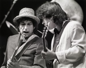 Bob Dylan performs on stage with former Rolling Stones guitarist Mick Taylor at Ahoy, Rotterdam, Netherlands, 4th June 1984. (Photo by Rob Verhorst/Redferns)