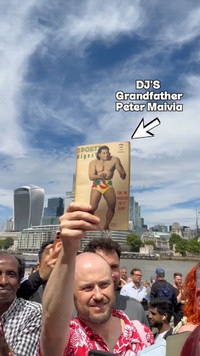 A fan gifts Dwayne Johnson (The Rock) a vintage wrestling magazine with his grandfather Peter Maivia on the cover.