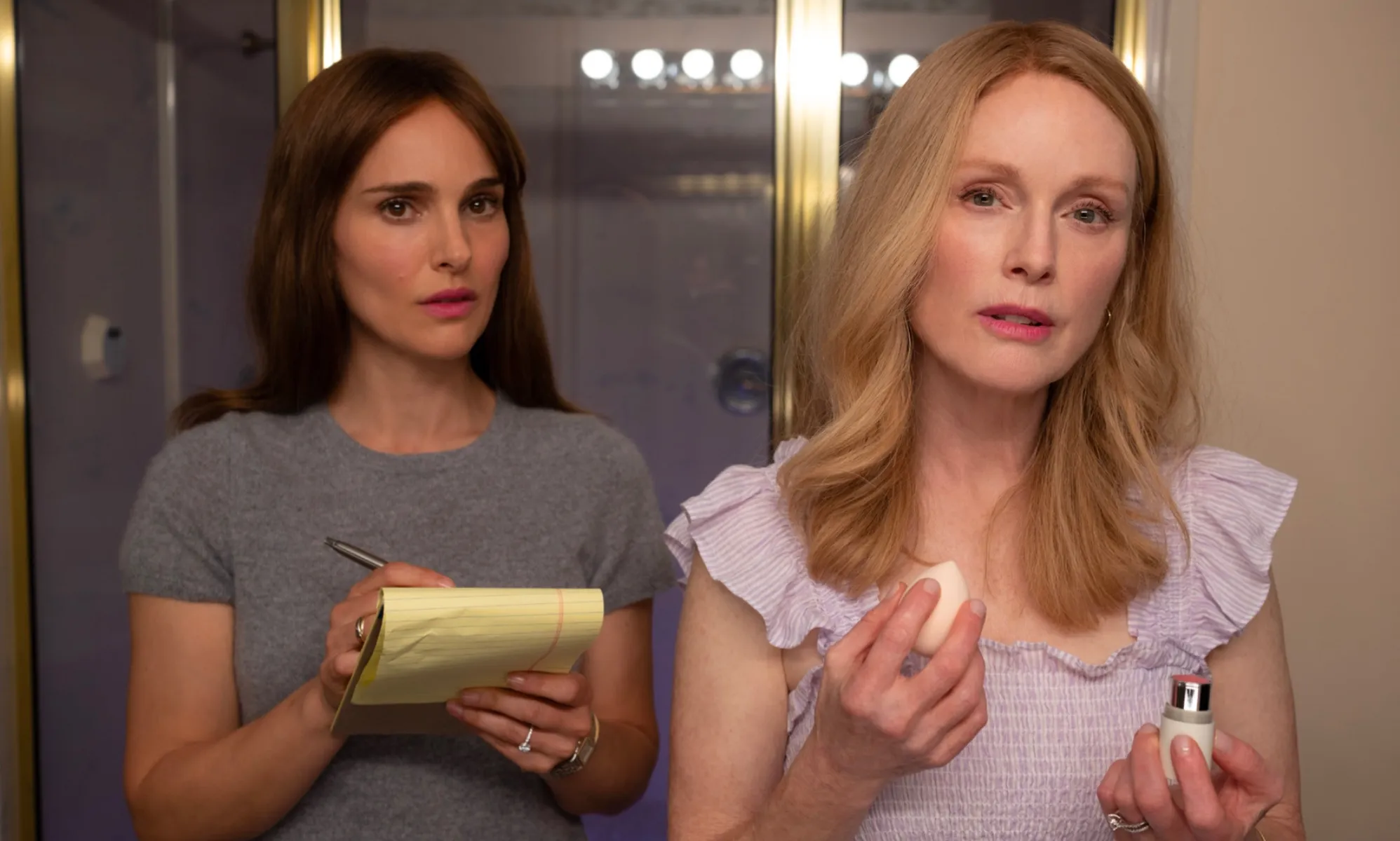 Natalie Portman (L) and Julianne Moore (R) star in May December)