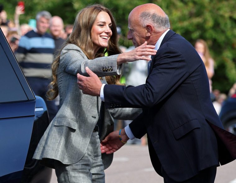 Britain's Catherine, Princess of Wales (L) reacts as she is greeted by Deputy Lieutenant of Suffolk, Jamie Lowther-Pinkerton, as she arrives to visit Sudbury Silk Mills in Sudbury, eastern England on September 11, 2025. (Photo by Chris RADBURN / AFP) (Photo by CHRIS RADBURN/AFP via Getty Images)